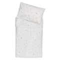 A folded bedding set featuring a duvet cover and matching pillowcase, both in white with a delicate, small-scale pastel pattern of flowers