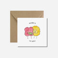 Welcome to the world Greeting card with a craft envelope on white background.