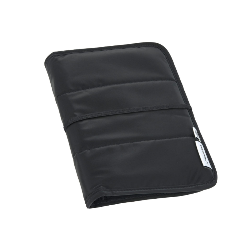 Black quilted napp change pouch on a white background
