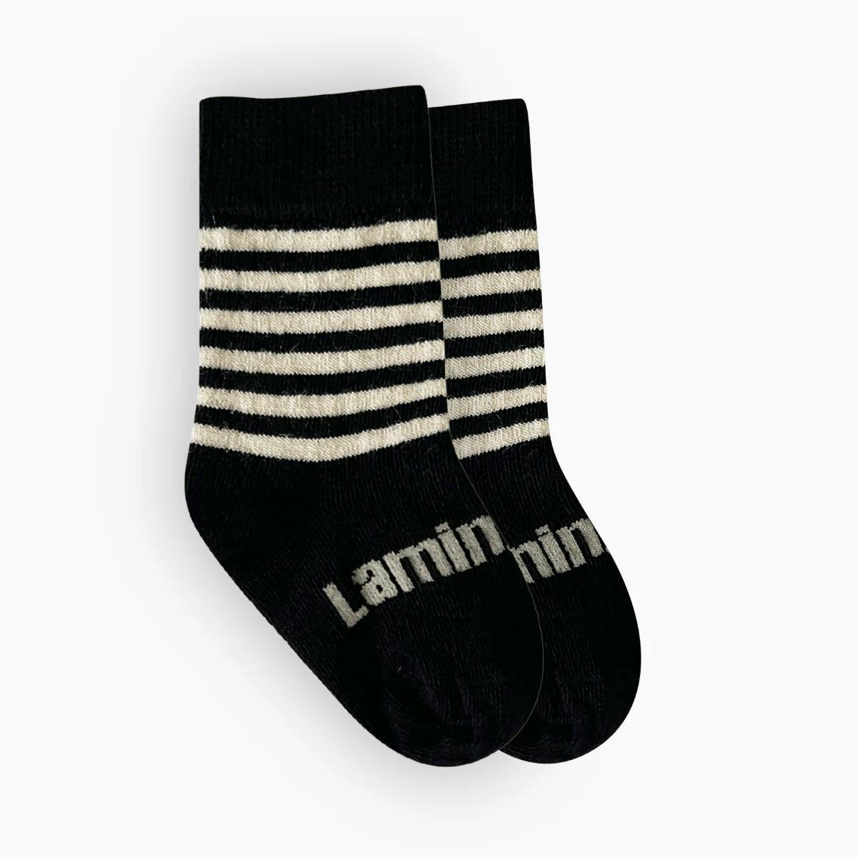 Black and White stripe merino crew socks on a white background
