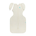 1.0 tog Swaddle Up Transition Bag - Houndstooth Tan, on a white background.