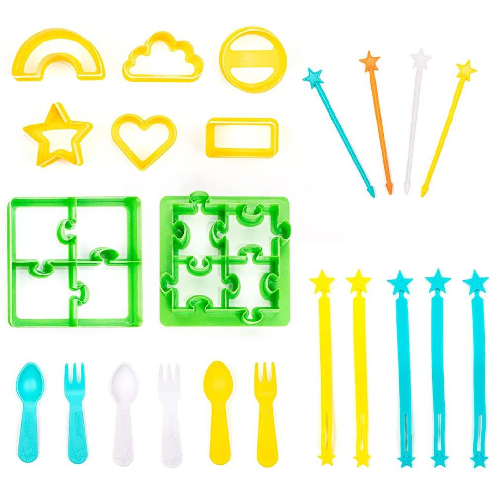 A children's lunch accessory set with plastic utensils and molds, including yellow and green puzzle-shaped pieces, blue, white, and yellow star-tipped picks, and matching blue, white, and yellow spoons and forks, all arranged on a white background.