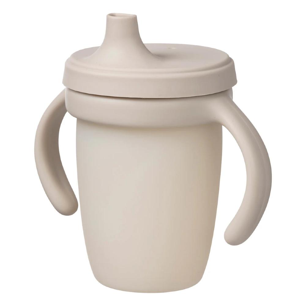 Beige sippy cup with handles and a lid on a white background