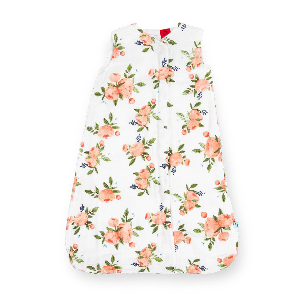 White and floral-patterned cotton muslin baby sleeping bag without sleeves on a white background