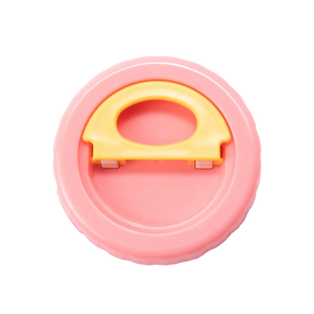 Pink lid with a yellow handle on a white background