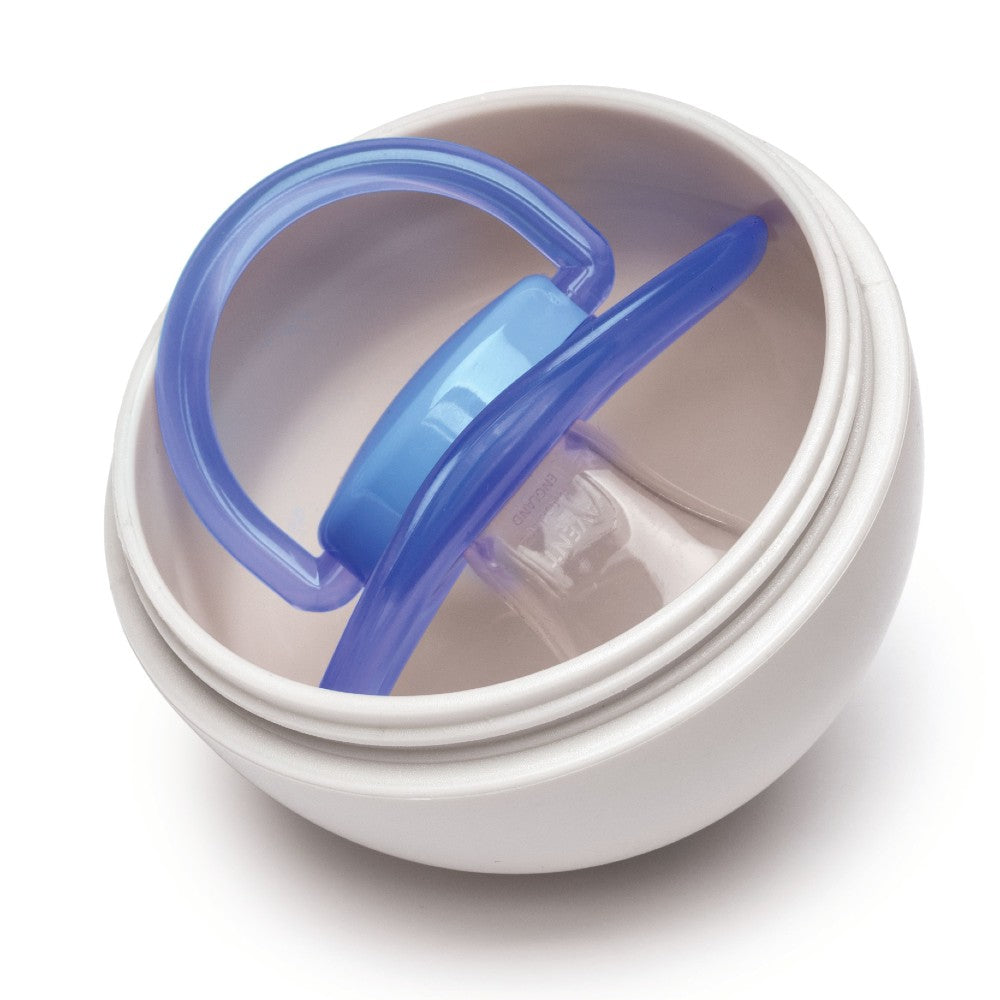 Blue and clear pacifier pod with dummy inside in a white container on a white background