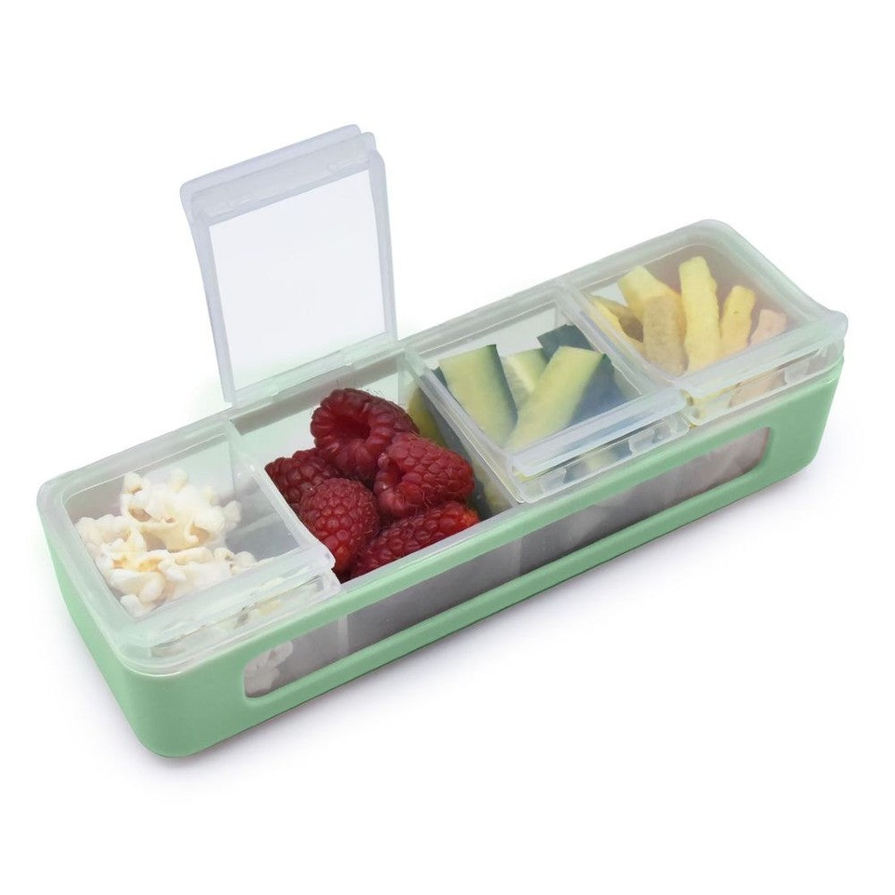 Melii Green compartmentalized snack container with snacks including popcorn, raspberries, and yellow snacks.