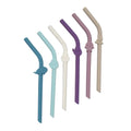 Set of colorful silicone straws on a white background