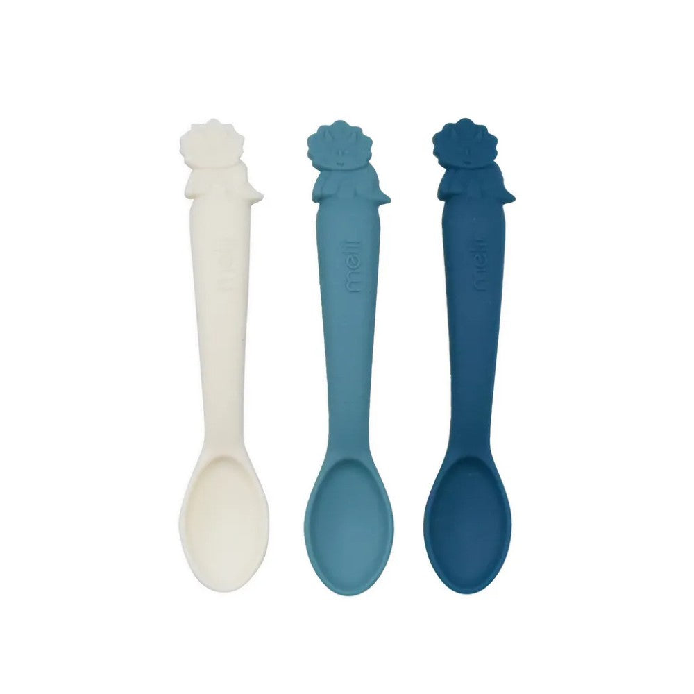 Three baby spoons with silicone handles on a white background