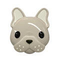Ceramic dog-shaped snack pot with a white background