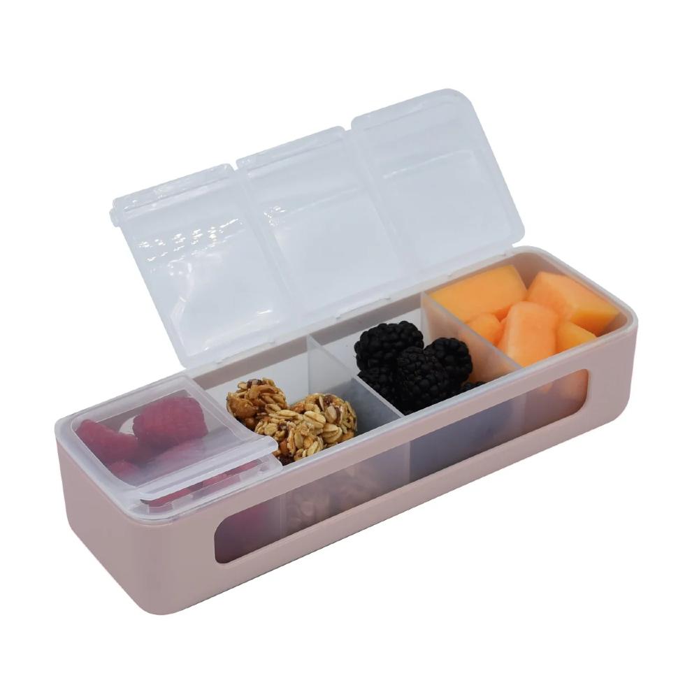 Rectangular snack container with compartments filled with various snacks on a white background