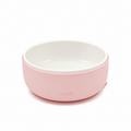 A ceramic bowl with a pink silicone sleeve, on a white background. 
