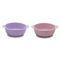 Two purple silicone suction bowls on a white background
