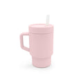 Pink silicone kids trainer mug with handle and straw on a white background