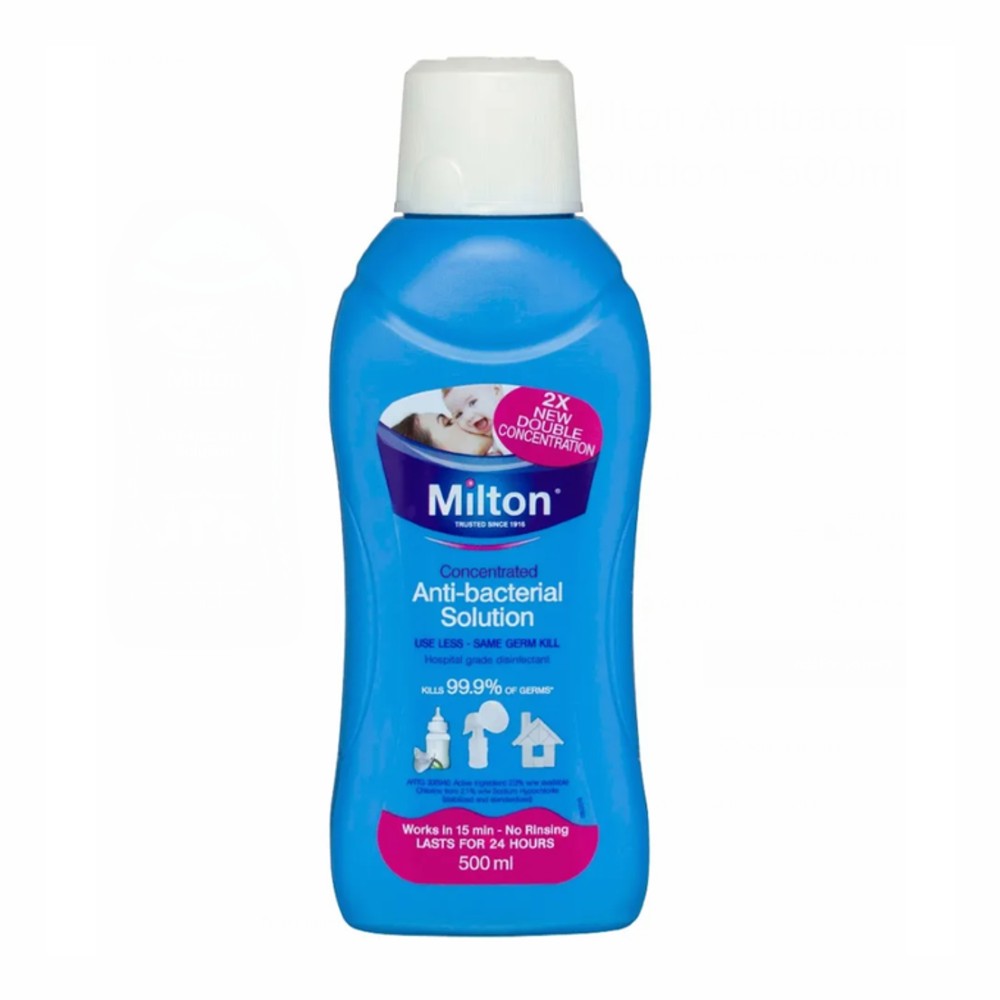 Blue Milton anti-bacterial solution bottle against white background.