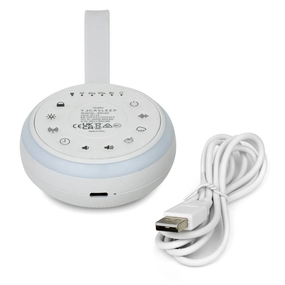 White baby soother with control panel and USB cable on a white background