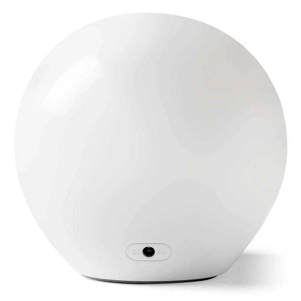 Rear view of white noise machine on a white background