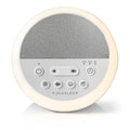 Yogasleep white noise machine with ligth on and control buttons showing on a white background