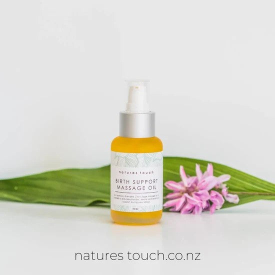 Natures Touch glass bottle against white background.