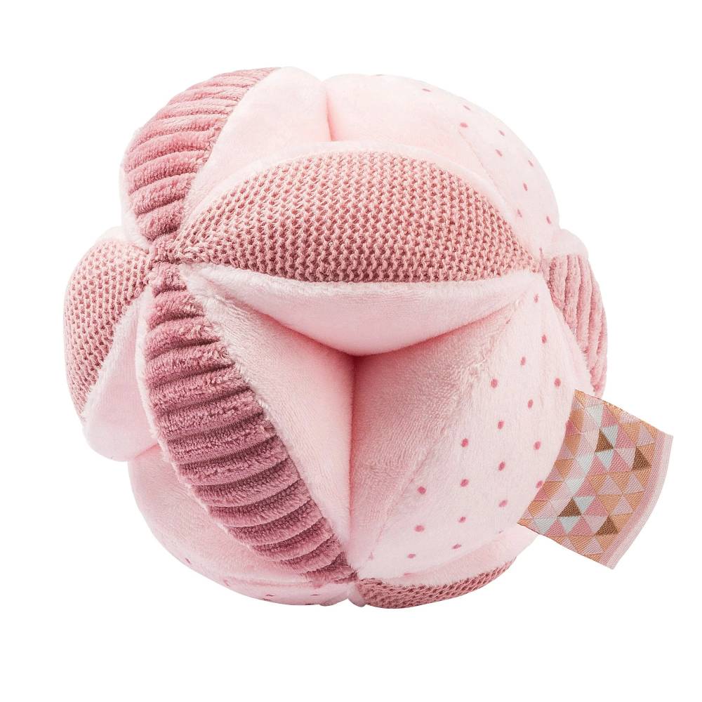 Pink soft toy ball with a patterned tag on a white background