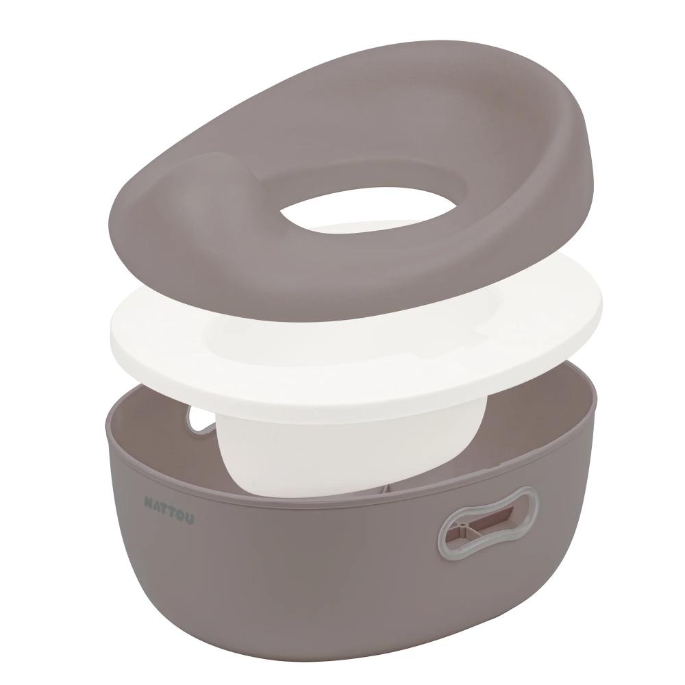 Taupe and white baby potty and toilet training seat on a white background