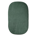 Green changing mat cover on a white background