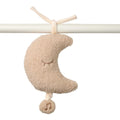 Plush moon-shaped musical toy with a smiley face on a white background