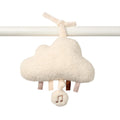 White fluffy cloud-shaped baby mobile with musical notes on a white background