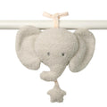 Plush elephant musical toy hanging from a white bar on a white background