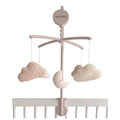 Baby mobile with cloud-shaped hanging toys on a white background