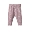A pair of baby leggings in dusty pink with a white dandelion pattern, featuring an elastic waistband and leg openings, shown against a plain white background.