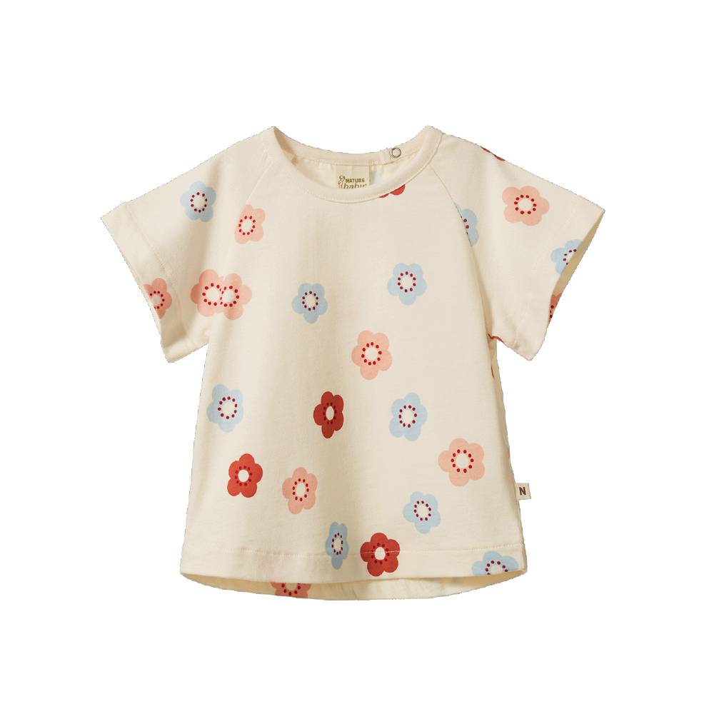 Cotton tee with a floral pattern on a white background. 