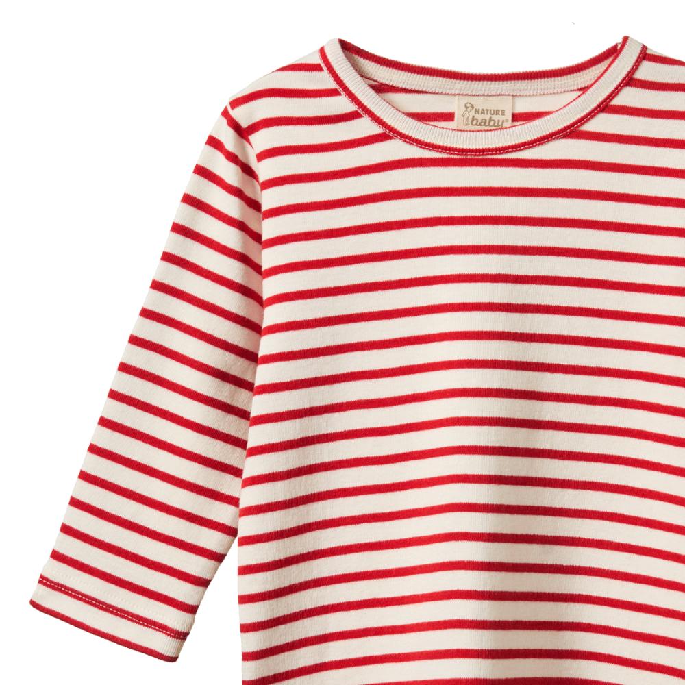 Close up of Red and white striped long-sleeve shirt on a white background