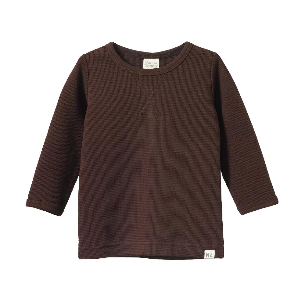 Cotton brown long-sleeve waffle textured shirt on a white background