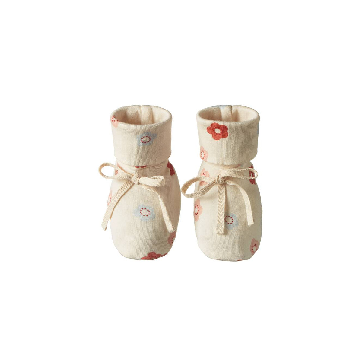 Cream cotton booties with a floral design on a white background. 