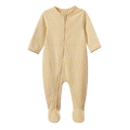 A baby footed sleeper in a pale yellow color with a white floral pattern, featuring a front zipper and long sleeves.