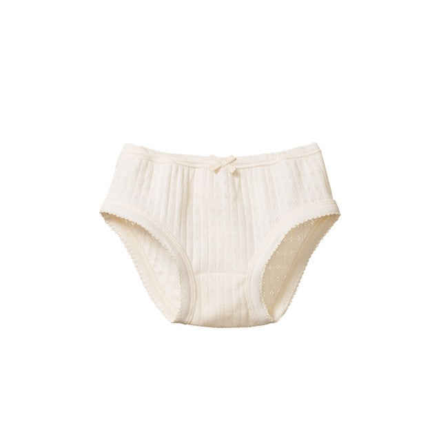Cotton pointelle girls underwear in a natural colour on a white background. 