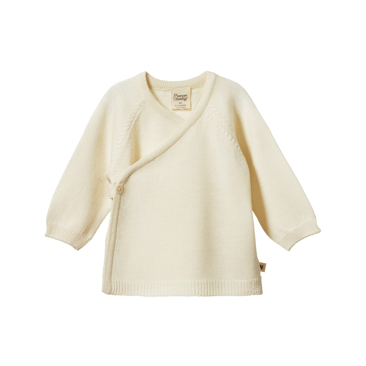 Cream-colored kimono style merino knit baby cardigan on a white background