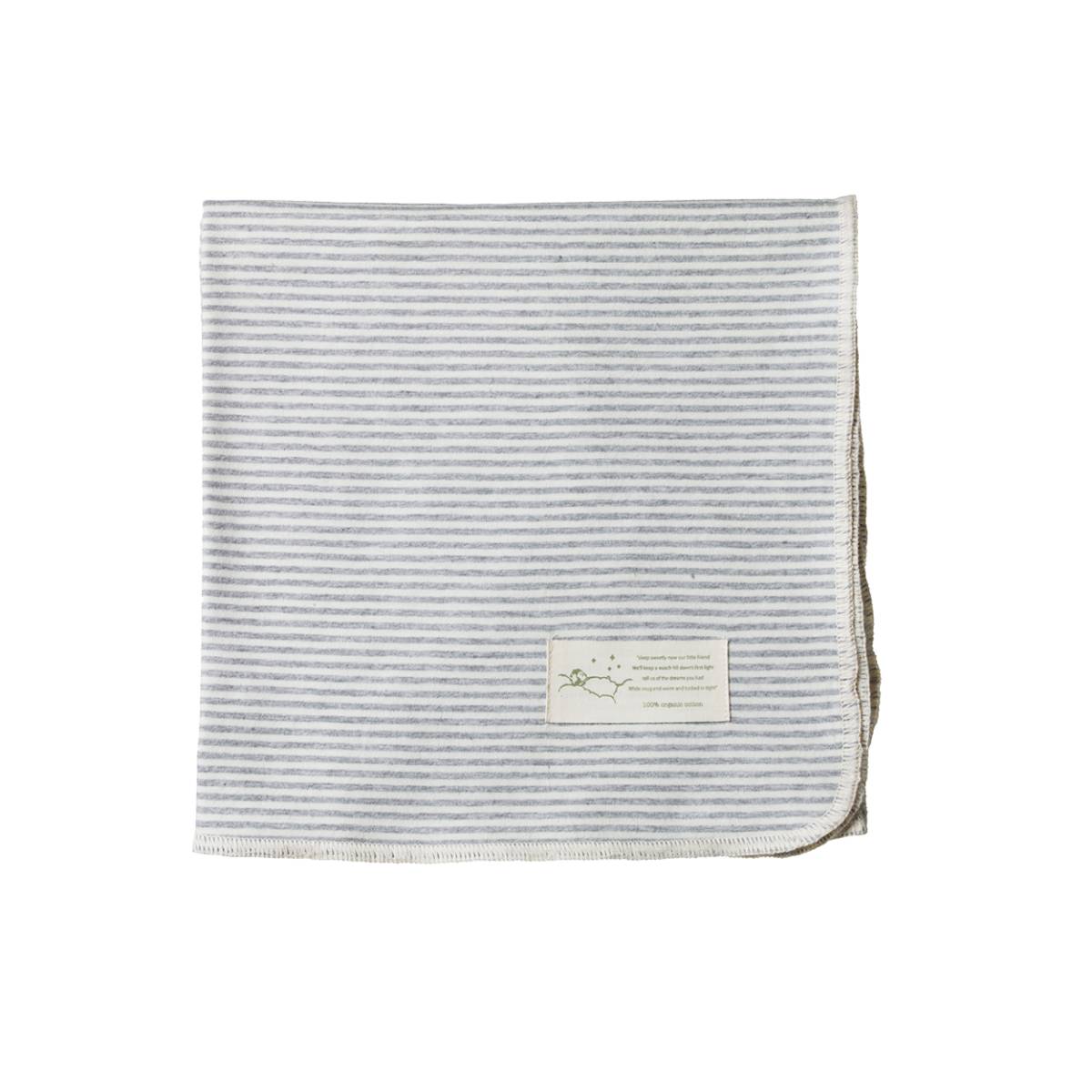 Jersey grey and white Striped fabric with a cream label on a white background