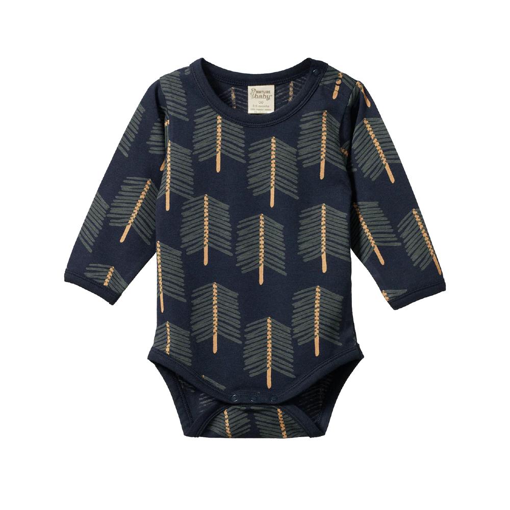 Navy cotton baby bodysuit with long sleeves and envelope neck and abstract tree pattern on a white background