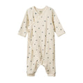 Cotton pointelle baby onesie without feet and a purple winter berry pattern on a white background