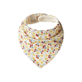 A baby bandana bib with a yellow and red floral pattern on a cream background, on a white background. 