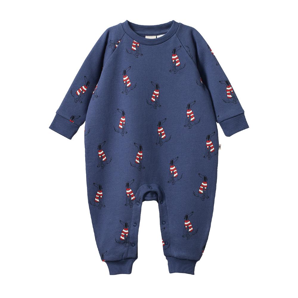 Navy blue baby crew neck romper with red and white dog pattern on a white background