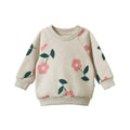 Beige marl coloured children's crew neck sweater with floral pattern on a white background