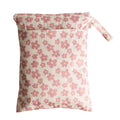 Floral-patterned wet bag with a zipper on a white background