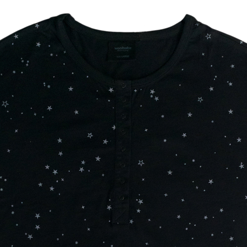 Black nightie with breastfeeding snaps t with star pattern on a white background