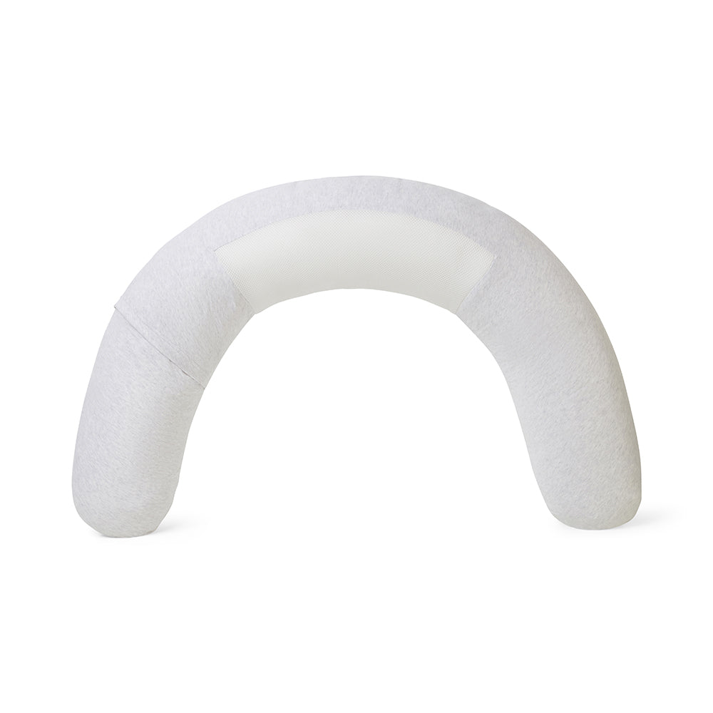White neck pillow with a curved design on a white background