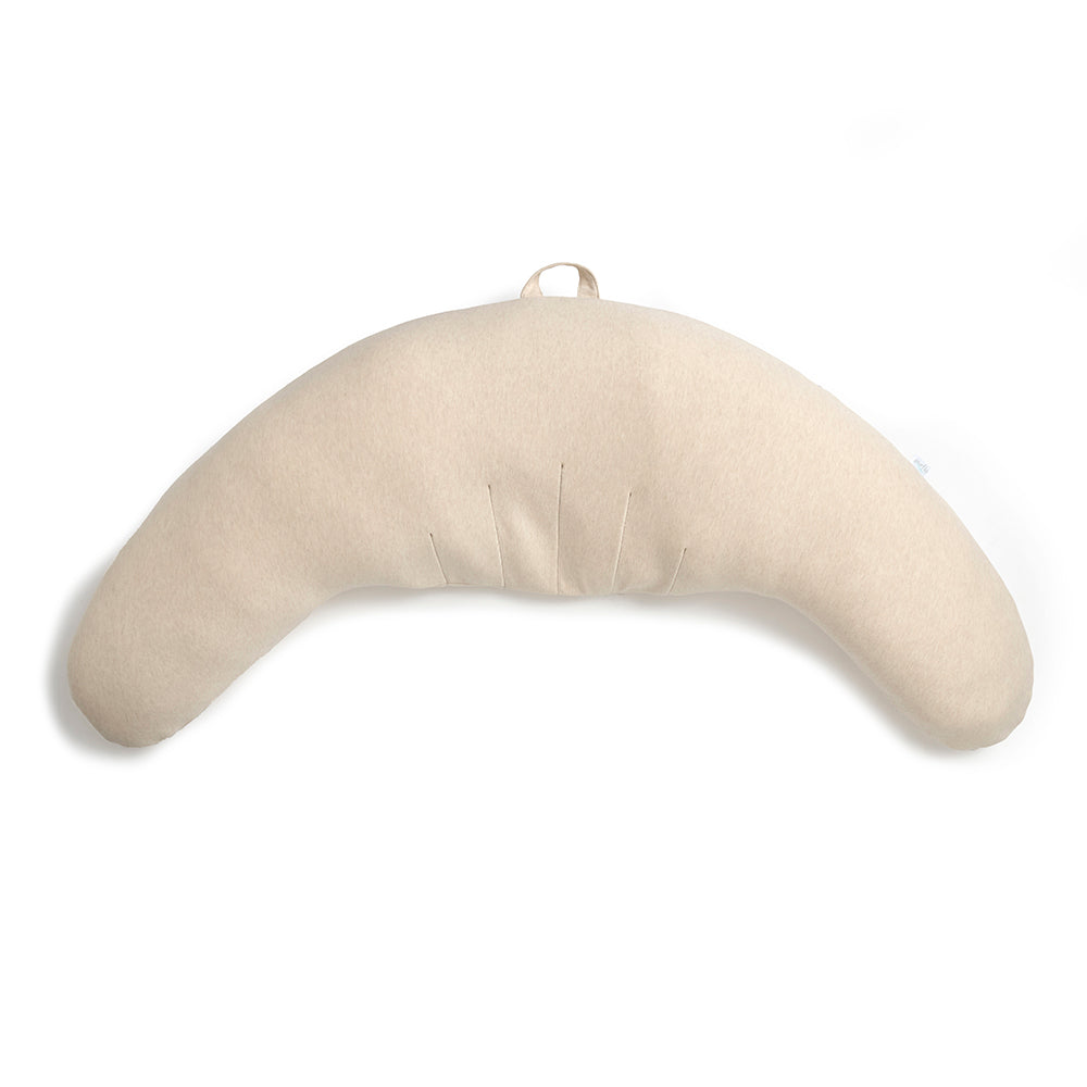 Beige crescent-shaped pregnancy pillow on a white background