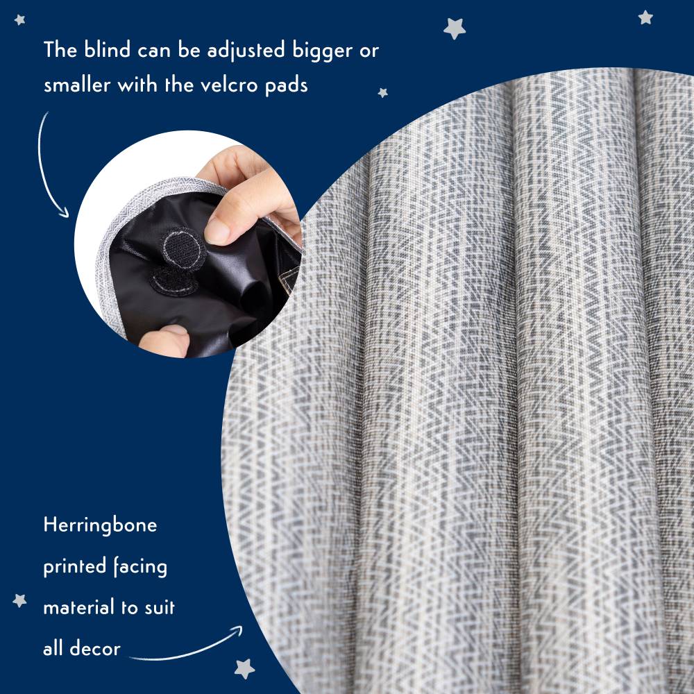 Gray herringbone patterned blind with a hand holding a black suction pad on a blue background.