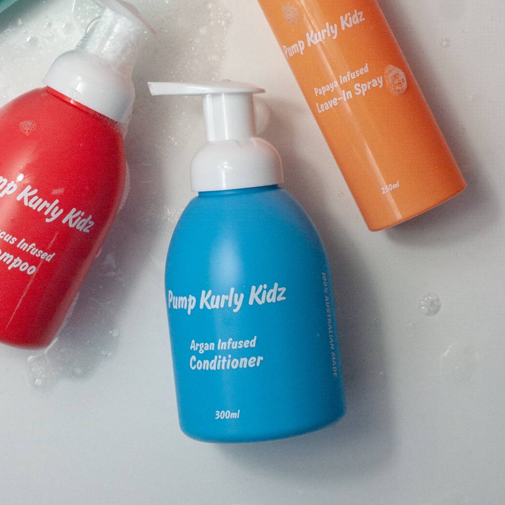 Pump Haircare bottle against white background.